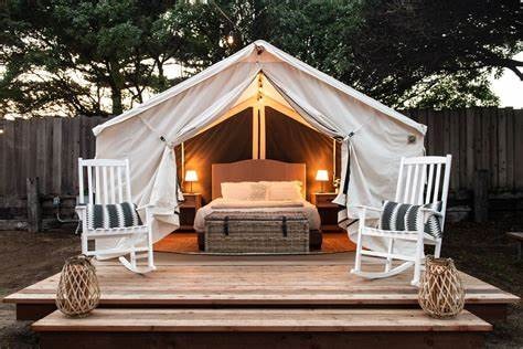 Luxury glamping tent with wood deck — RV resorts and glamping valuation